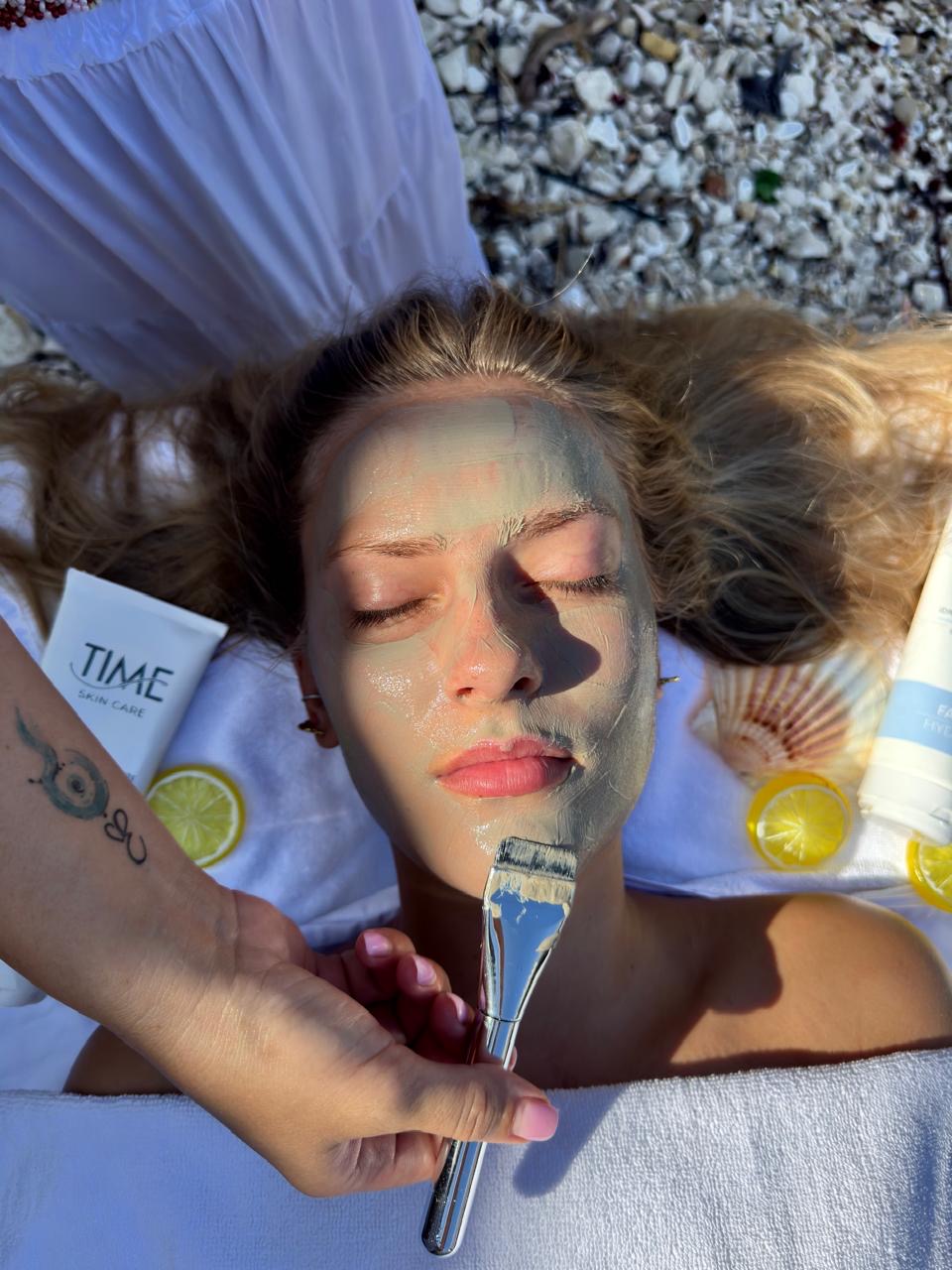 Facial clay mask applied with a brush